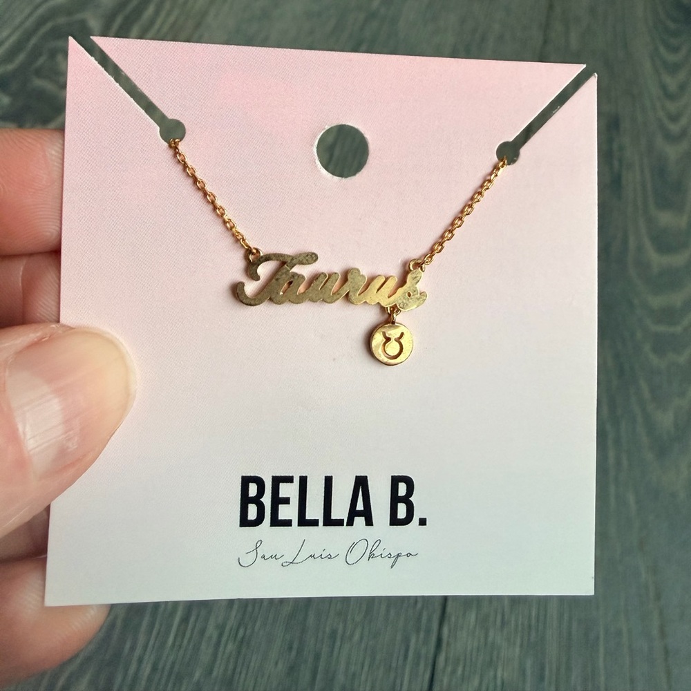 Taurus Zodiac Cursive Charm Necklace In Gold